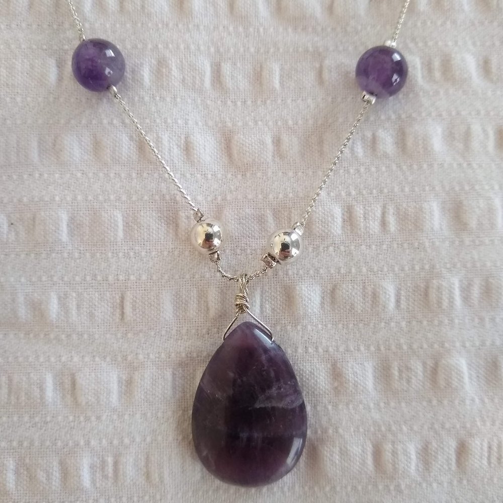 purple and silver necklace